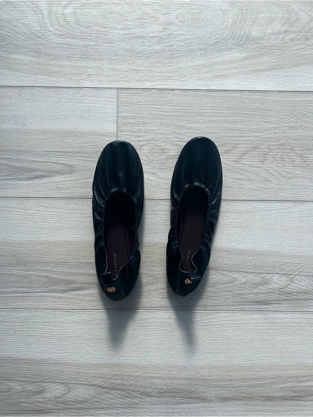 Tory Burch “Eddie” Black Ballet Flats with Gold Logo Button